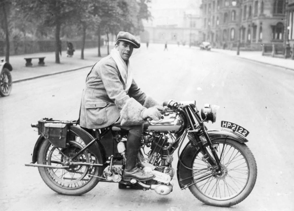 George Brough with a Brough Superior motorcycle